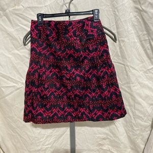 H&M woman’s pink, red and black skirt size 4 never worn